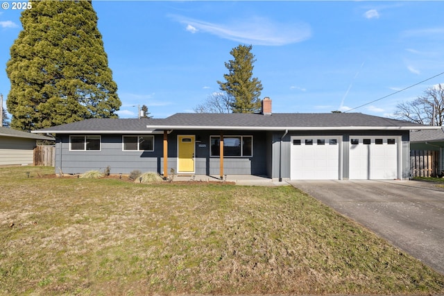 single story home featuring a front lawn and a garage