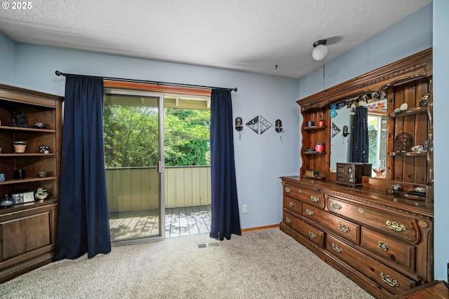7360 SE Imperial Ct, Milwaukie, OR 97222 - carpeted bedroom with access to outside and a textured ceiling