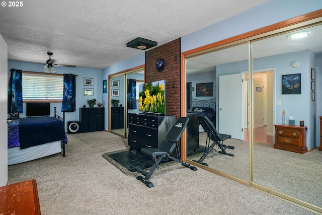7360 SE Imperial Ct, Milwaukie, OR 97222 - carpeted bedroom with a closet, a textured ceiling, and a ceiling fan