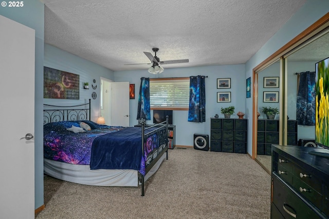 7360 SE Imperial Ct, Milwaukie, OR 97222 - bedroom featuring carpet flooring, ceiling fan, a textured ceiling, and a closet
