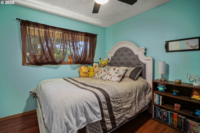 7360 SE Imperial Ct, Milwaukie, OR 97222 - bedroom featuring wood finished floors, a textured ceiling, and a ceiling fan
