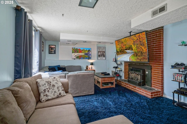 7360 SE Imperial Ct, Milwaukie, OR 97222 - carpeted living room featuring a textured ceiling and a fireplace