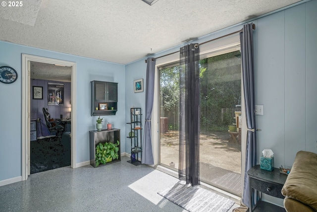 7360 SE Imperial Ct, Milwaukie, OR 97222 - doorway with a textured ceiling and speckle patterned floor