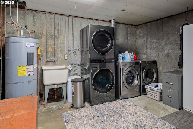 7360 SE Imperial Ct, Milwaukie, OR 97222 - laundry area with water heater and stacked washer and clothes dryer