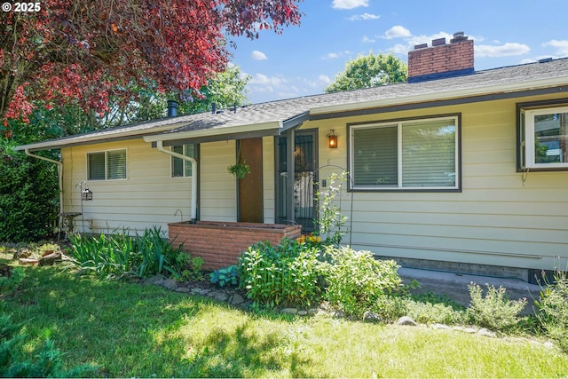 7360 SE Imperial Ct, Milwaukie, OR 97222 - ranch-style house with a chimney and a front yard