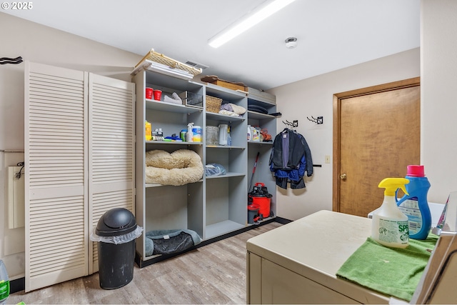 mudroom with light hardwood / wood-style flooring