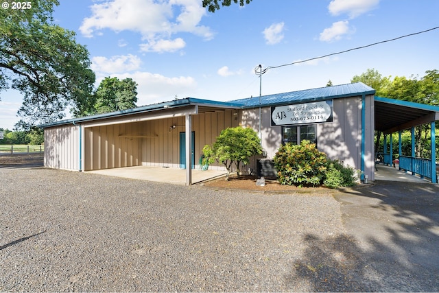 view of front of house with a carport