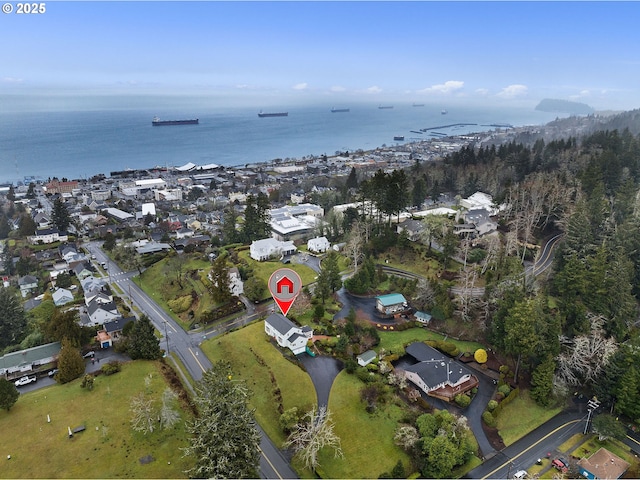 birds eye view of property featuring a water view