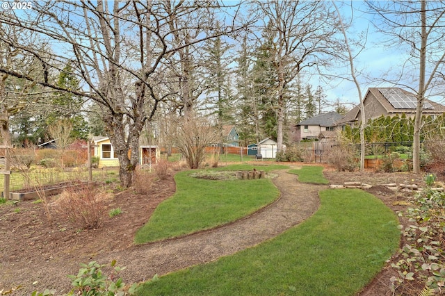 view of yard featuring fence