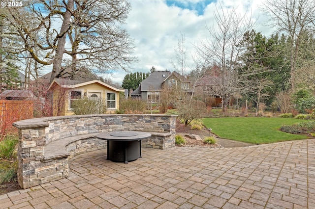 view of patio featuring an outdoor fire pit