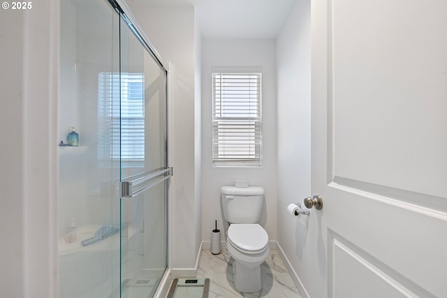 2504 Brackenfern Rd, Eugene, OR 97403 - bathroom with toilet, marble finish flooring, a stall shower, and baseboards