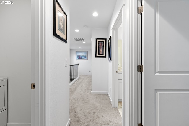 2504 Brackenfern Rd, Eugene, OR 97403 - hallway featuring carpet flooring, baseboards, washer / clothes dryer, and recessed lighting