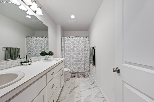 2504 Brackenfern Rd, Eugene, OR 97403 - bathroom featuring double vanity, toilet, marble look tile flooring, curtained shower, and baseboards