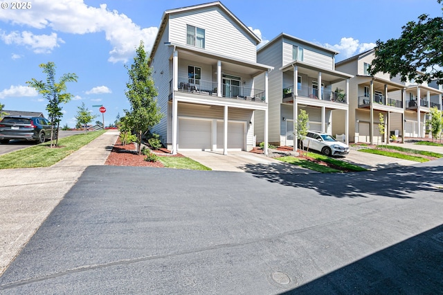 2504 Brackenfern Rd, Eugene, OR 97403 - townhome / multi-family property featuring an attached garage and driveway