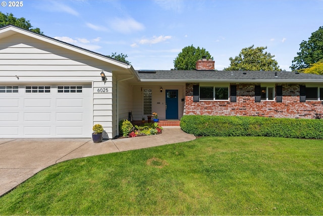 6025 SW Spruce Ave, Beaverton, OR 97005 - ranch-style home with a chimney, concrete driveway, a front yard, and brick siding