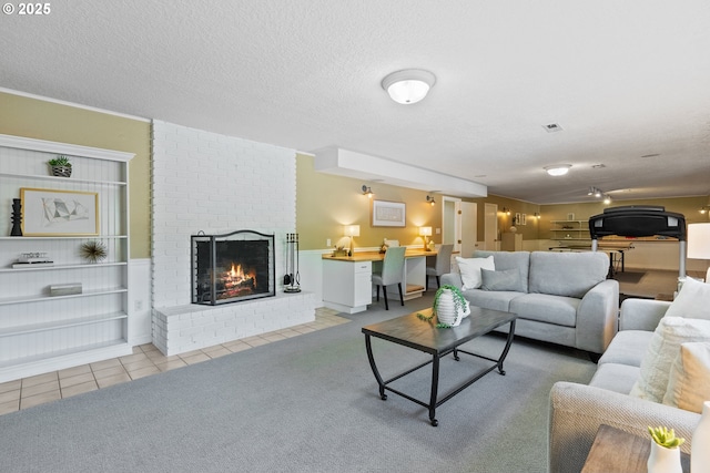 6025 SW Spruce Ave, Beaverton, OR 97005 - carpeted living room featuring a fireplace, tile patterned flooring, and a textured ceiling