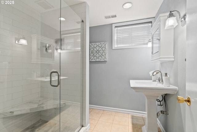 6025 SW Spruce Ave, Beaverton, OR 97005 - full bath with tile patterned floors, a stall shower, and baseboards
