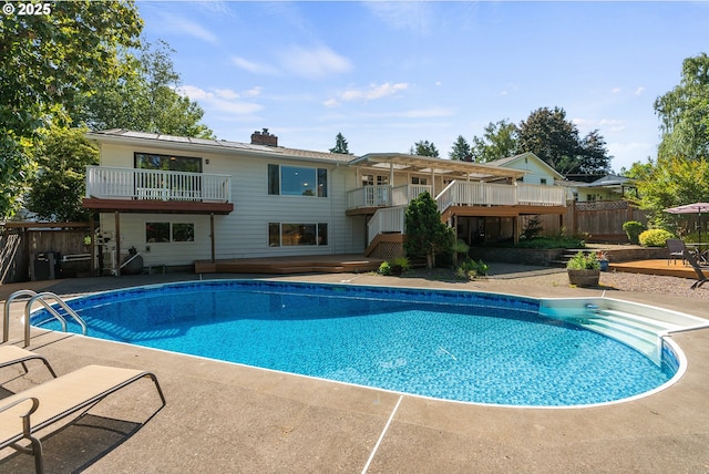 6025 SW Spruce Ave, Beaverton, OR 97005 - view of swimming pool with a patio and a wooden deck