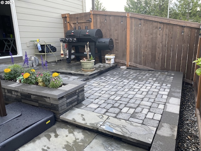 view of patio / terrace featuring a grill