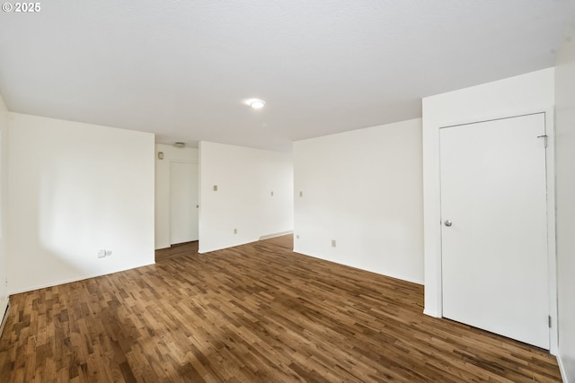 unfurnished room featuring wood finished floors