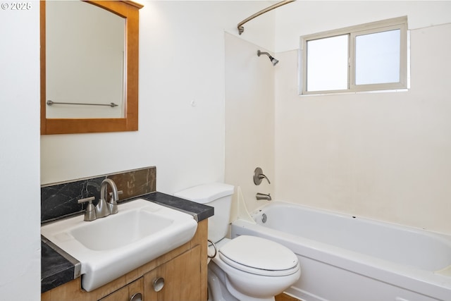 full bathroom featuring vanity, toilet, and  shower combination