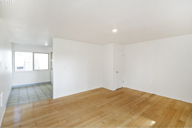 empty room with light wood-style floors