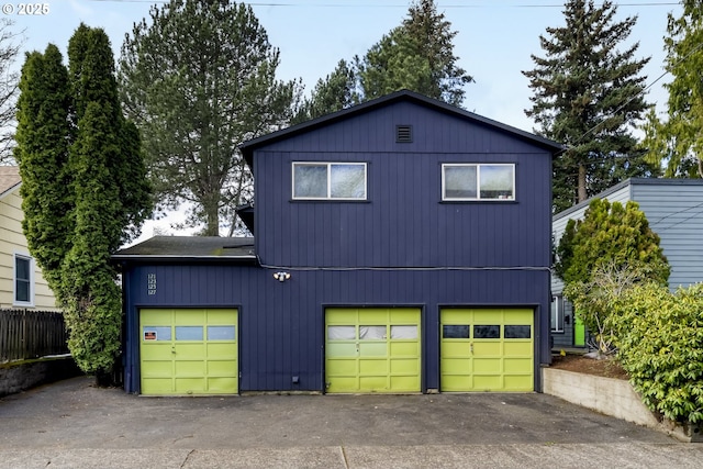 garage featuring driveway