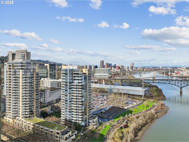 aerial view featuring a water view and a city view