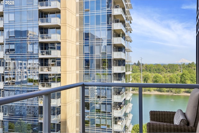 balcony featuring a water view