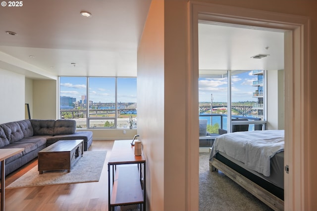 interior space featuring a city view and wood finished floors