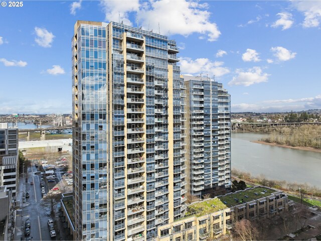 view of property with a water view