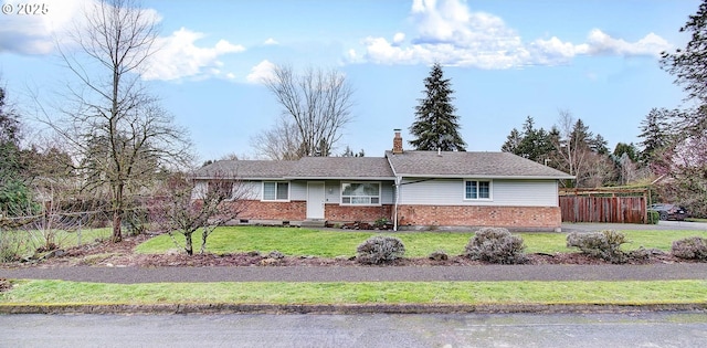 view of front of house with a front lawn