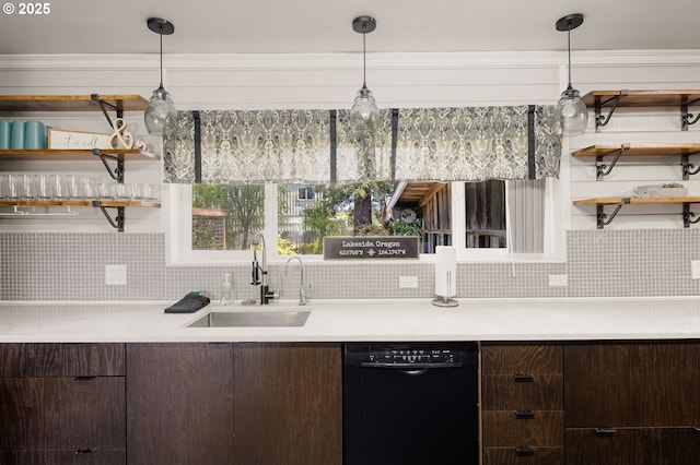 bar with a sink, pendant lighting, backsplash, and black dishwasher