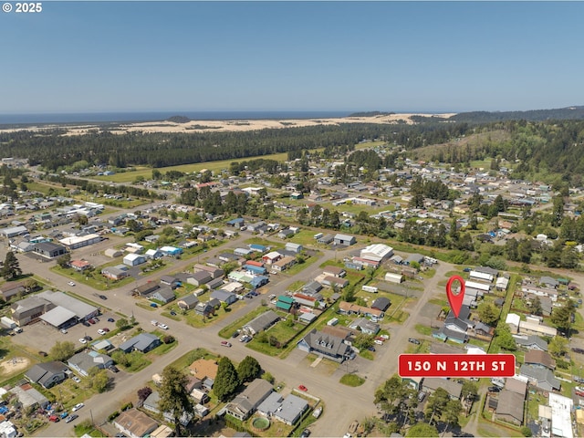 aerial view with a residential view and a forest view