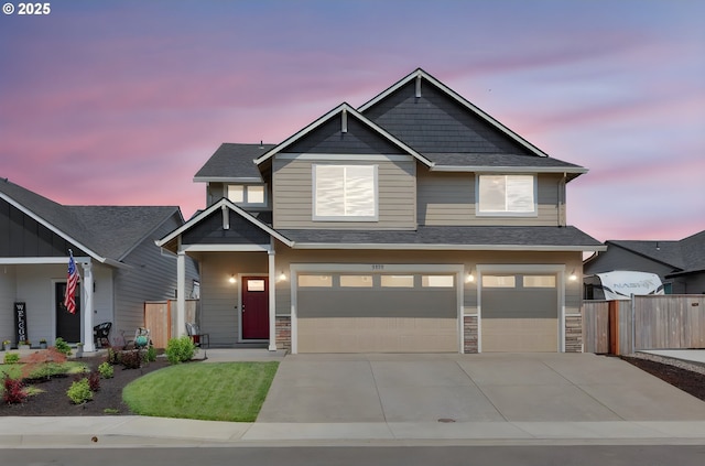 craftsman inspired home with a garage