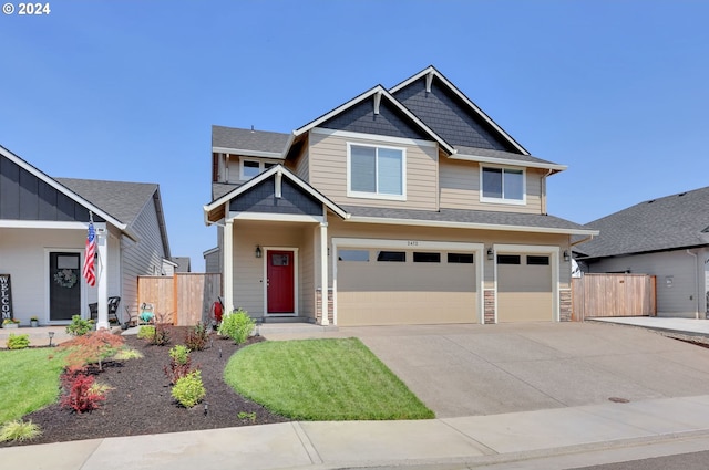 craftsman house with a garage