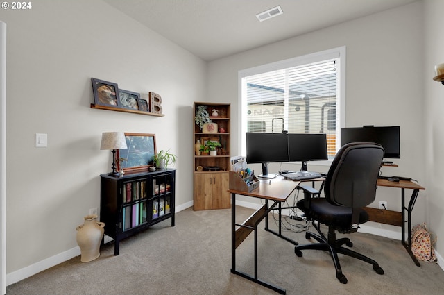 home office featuring light colored carpet