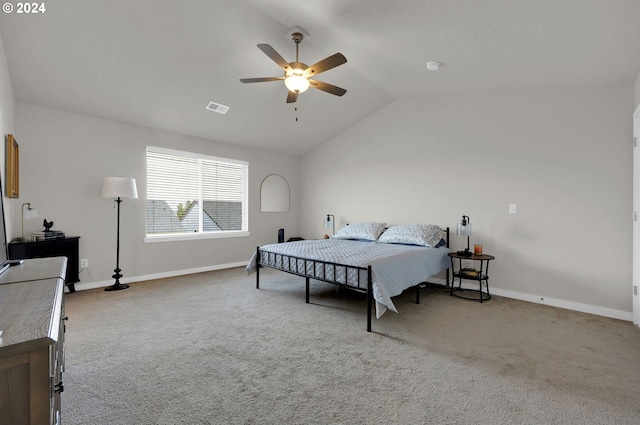 bedroom with ceiling fan, light colored carpet, and lofted ceiling