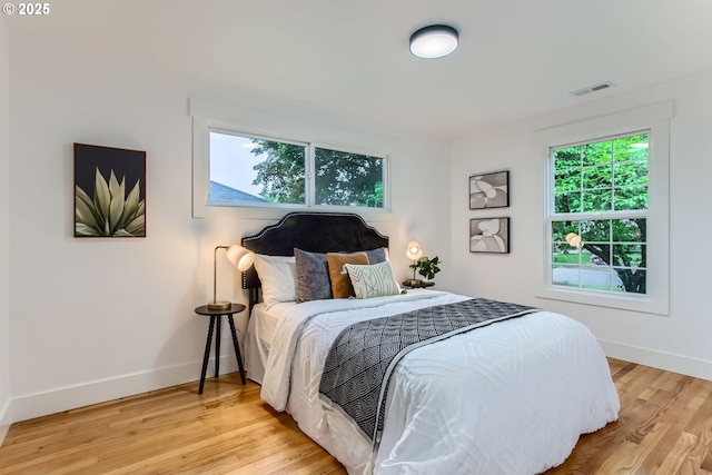 11940 SW Edgewood St, Portland, OR 97225 - bedroom with light wood-style floors and baseboards