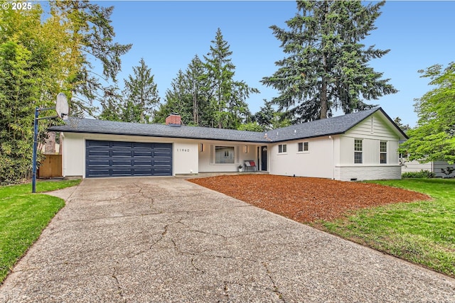 11940 SW Edgewood St, Portland, OR 97225 - single story home with a garage, driveway, a front yard, and a chimney