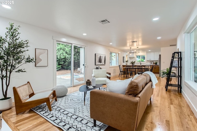 11940 SW Edgewood St, Portland, OR 97225 - living room featuring light wood-style flooring, recessed lighting, and baseboards