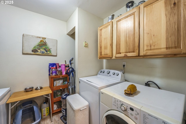 1274 Wild Mustang Ln, Gilchrist, OR 97737 - laundry area with washer and clothes dryer and cabinet space