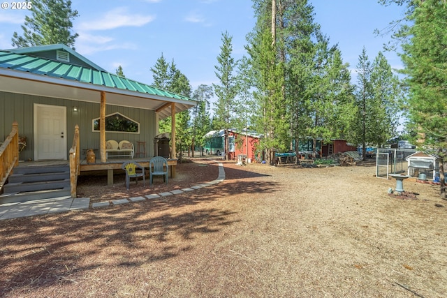 1274 Wild Mustang Ln, Gilchrist, OR 97737 - view of yard with an outbuilding