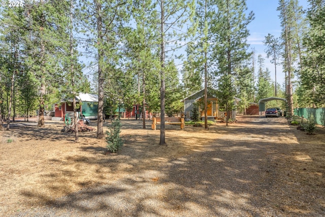 1274 Wild Mustang Ln, Gilchrist, OR 97737 - view of yard with a carport
