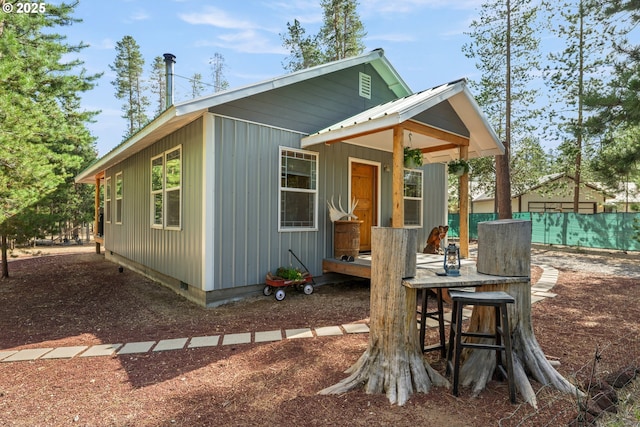 1274 Wild Mustang Ln, Gilchrist, OR 97737 - view of front of home with crawl space and board and batten siding