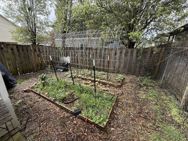 2732 SE 87th Ave, Portland, OR 97266 - fenced backyard with a garden
