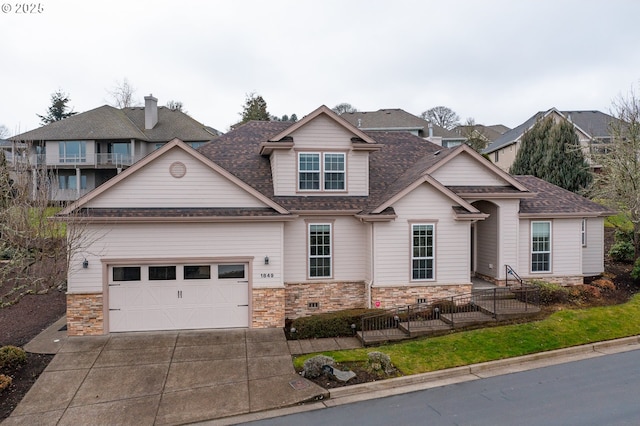 craftsman-style home featuring a garage