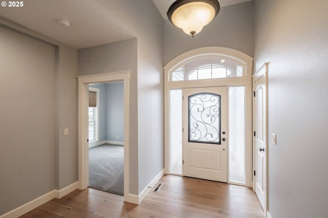 foyer entrance featuring light hardwood / wood-style flooring