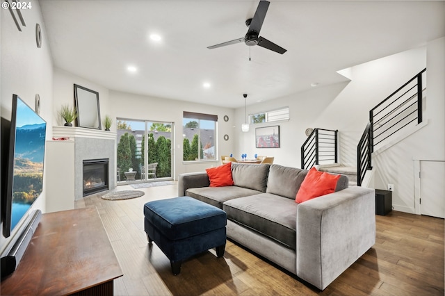 14410 SW Aiken Ln, Beaverton, OR 97005 - living room with light wood-style flooring, ceiling fan, stairs, and recessed lighting