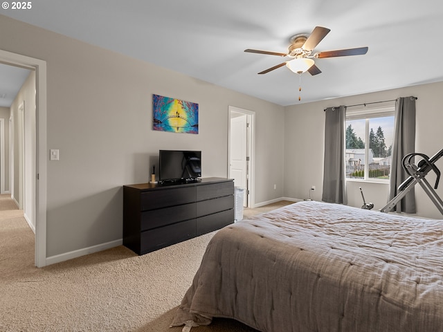 bedroom featuring light colored carpet and ceiling fan